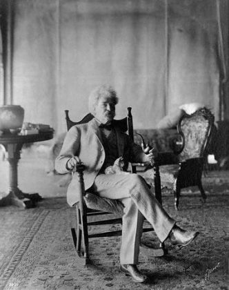 Mark Twain Holding Cat on Lap